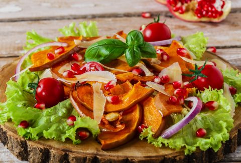 salad of roasted pumpkin and pomegranate cherry tomatoes